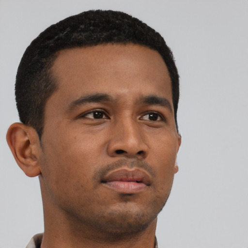 Neutral latino young-adult male with short  brown hair and brown eyes