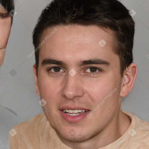 Joyful white young-adult male with short  brown hair and brown eyes