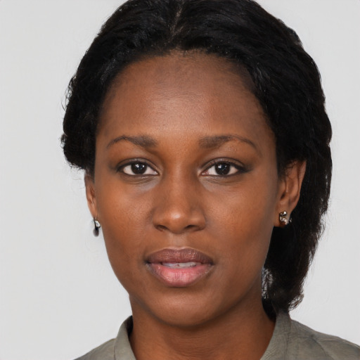 Neutral black young-adult female with medium  black hair and brown eyes