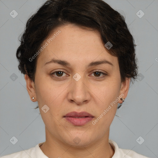 Joyful white adult female with short  brown hair and brown eyes