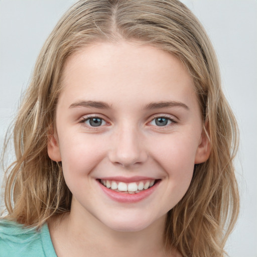 Joyful white young-adult female with long  brown hair and blue eyes