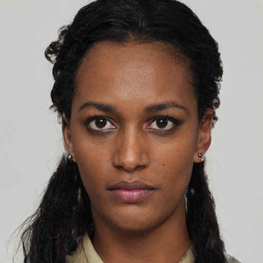 Neutral black young-adult female with long  black hair and brown eyes