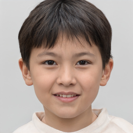 Joyful white child female with short  brown hair and brown eyes