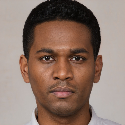 Neutral black young-adult male with short  black hair and brown eyes