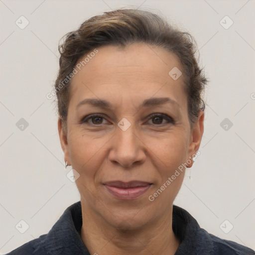 Joyful white adult female with short  brown hair and brown eyes