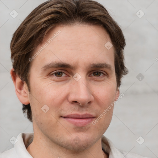 Joyful white adult male with short  brown hair and grey eyes