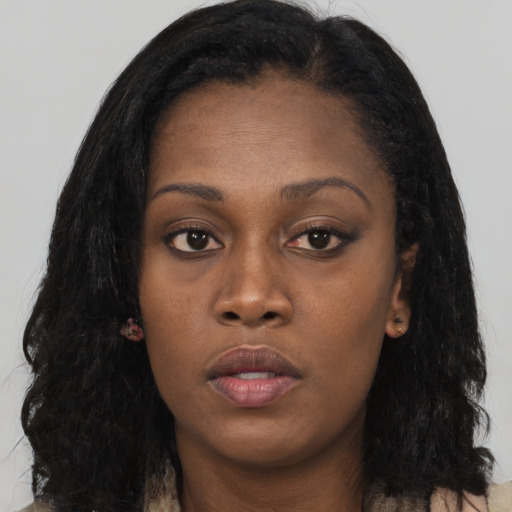 Neutral black young-adult female with long  black hair and brown eyes