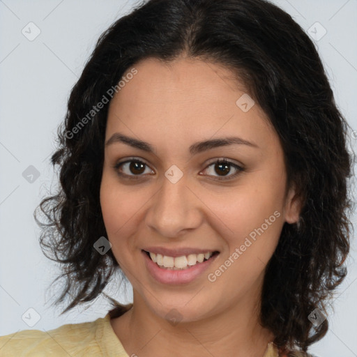 Joyful latino young-adult female with medium  brown hair and brown eyes