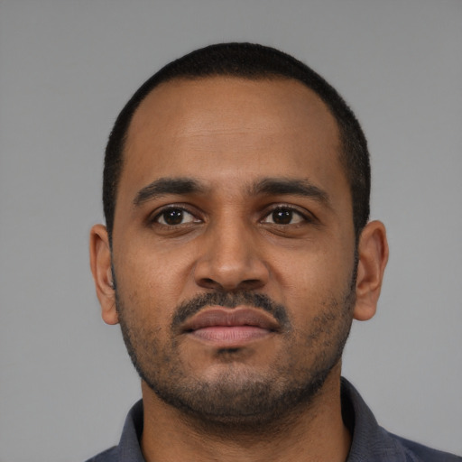 Neutral black young-adult male with short  black hair and brown eyes
