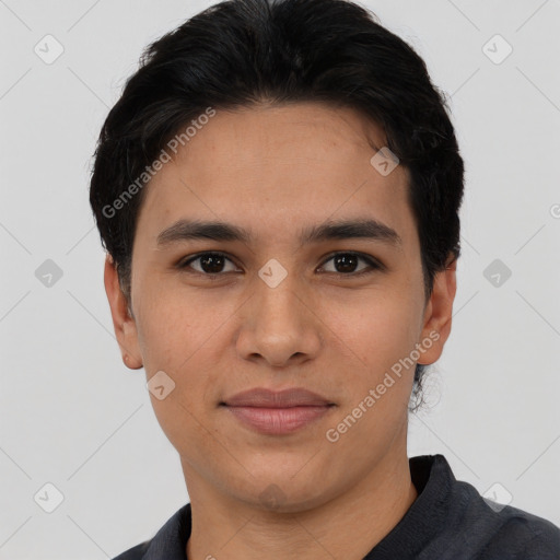 Joyful asian young-adult male with short  black hair and brown eyes