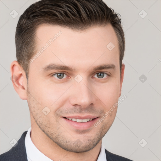 Joyful white young-adult male with short  brown hair and brown eyes