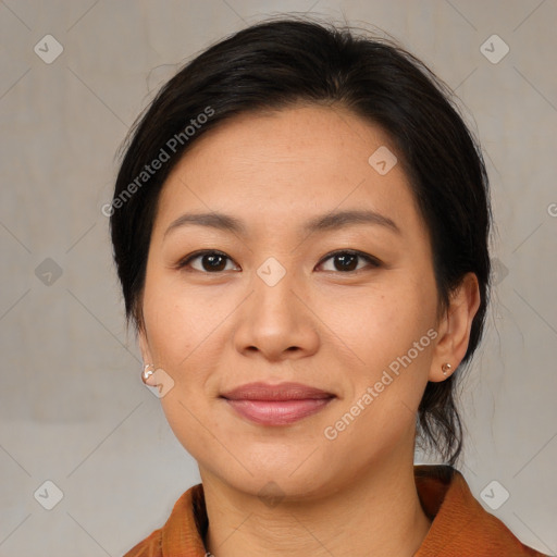 Joyful asian young-adult female with medium  brown hair and brown eyes