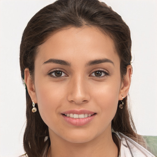 Joyful white young-adult female with long  brown hair and brown eyes