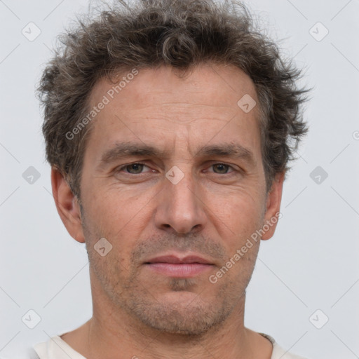 Neutral white adult male with short  brown hair and brown eyes