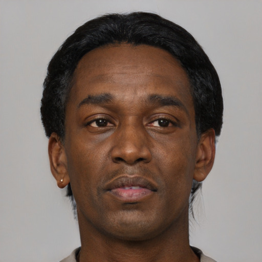 Neutral black adult male with short  black hair and brown eyes