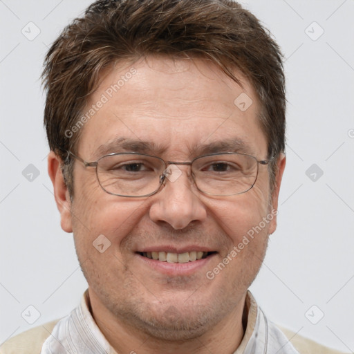 Joyful white adult male with short  brown hair and brown eyes