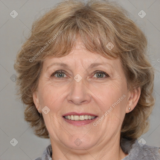 Joyful white middle-aged female with medium  brown hair and grey eyes