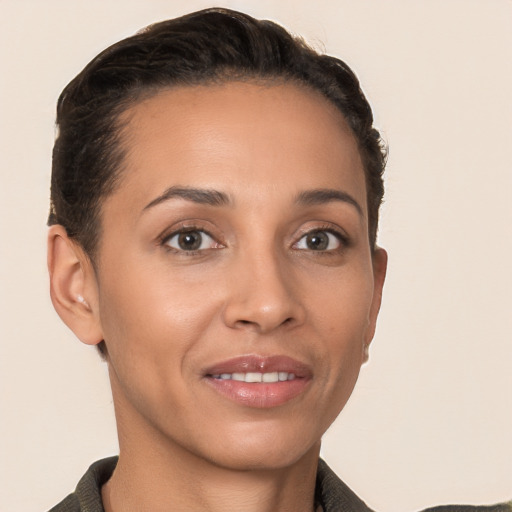 Joyful white young-adult female with short  brown hair and brown eyes