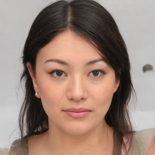 Neutral asian young-adult female with medium  brown hair and brown eyes