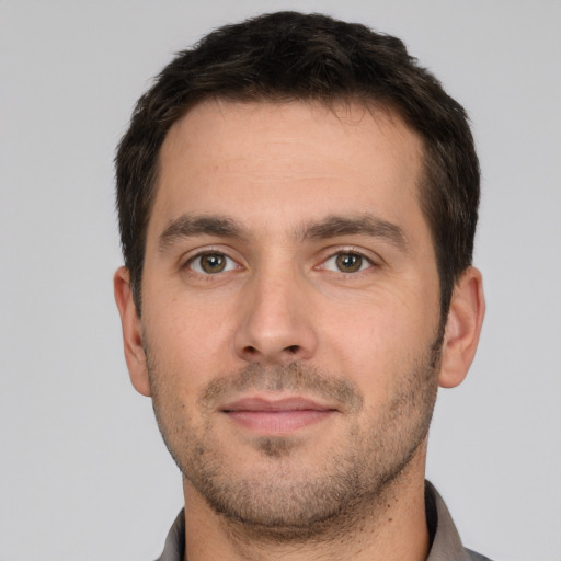Neutral white young-adult male with short  brown hair and brown eyes