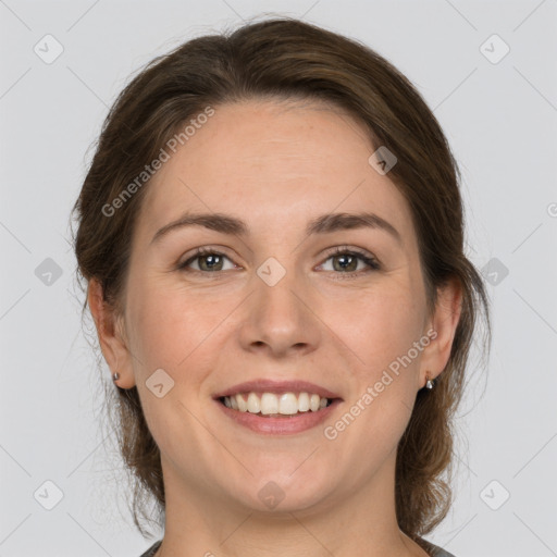 Joyful white young-adult female with medium  brown hair and grey eyes