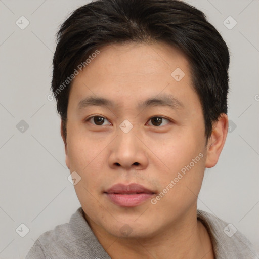 Neutral asian young-adult male with short  brown hair and brown eyes