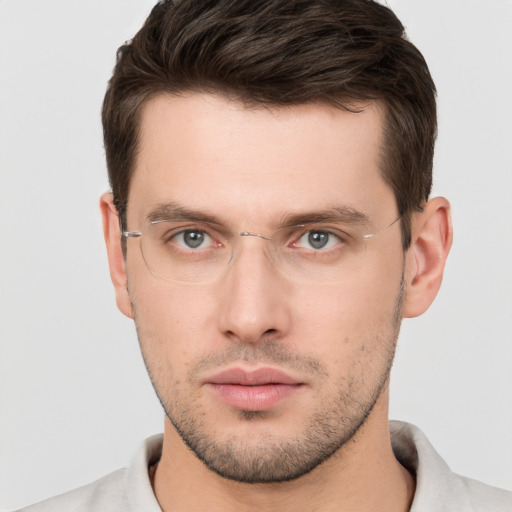 Neutral white young-adult male with short  brown hair and brown eyes