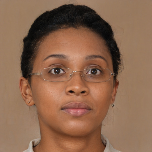 Neutral black young-adult female with short  brown hair and brown eyes