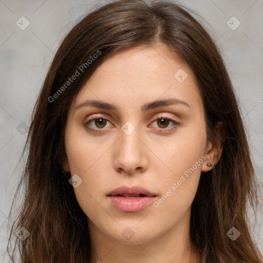 Neutral white young-adult female with long  brown hair and brown eyes