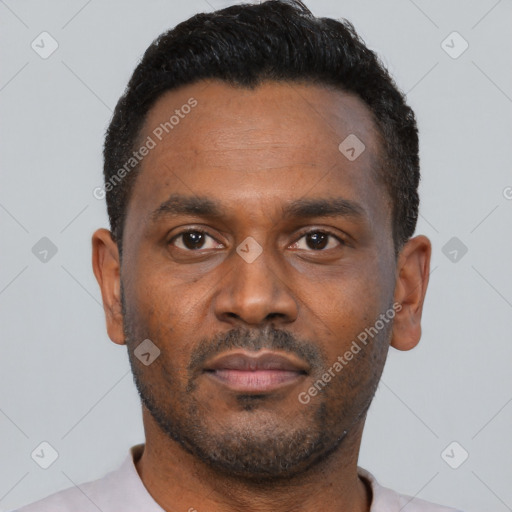 Neutral latino young-adult male with short  black hair and brown eyes