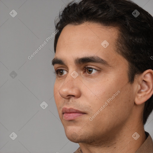 Neutral white young-adult male with short  black hair and brown eyes