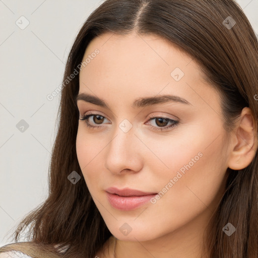 Neutral white young-adult female with long  brown hair and brown eyes