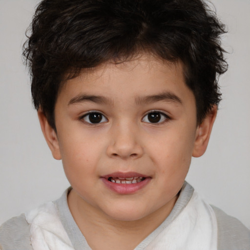 Joyful white child male with short  brown hair and brown eyes