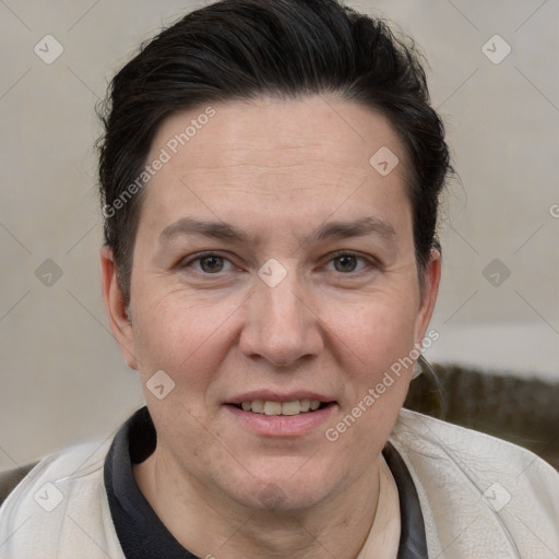 Joyful white adult female with short  brown hair and brown eyes