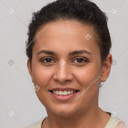 Joyful white young-adult female with short  brown hair and brown eyes