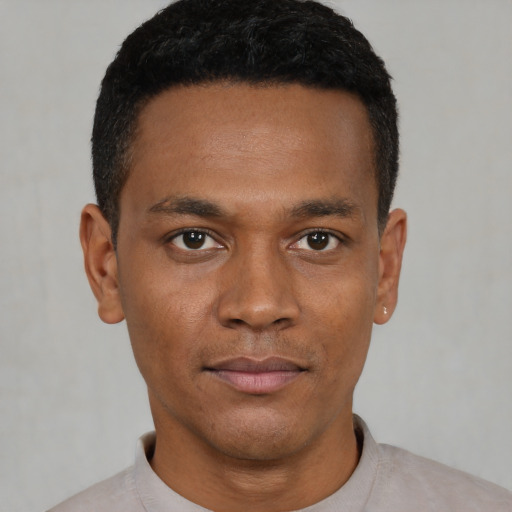 Neutral black young-adult male with short  black hair and brown eyes