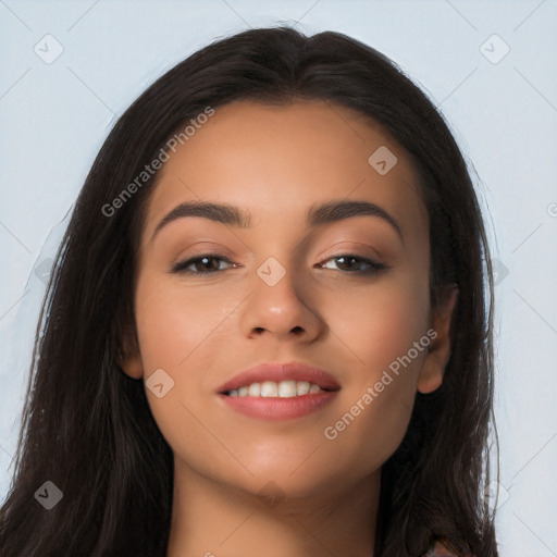 Joyful latino young-adult female with long  black hair and brown eyes