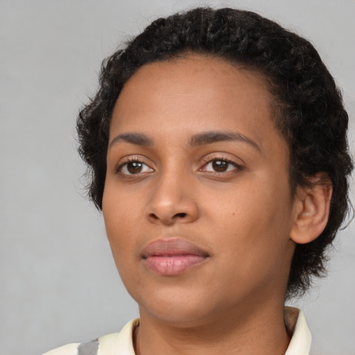 Neutral latino young-adult female with short  black hair and brown eyes