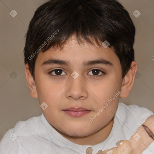 Joyful white child male with short  brown hair and brown eyes