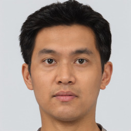 Neutral asian young-adult male with short  black hair and brown eyes