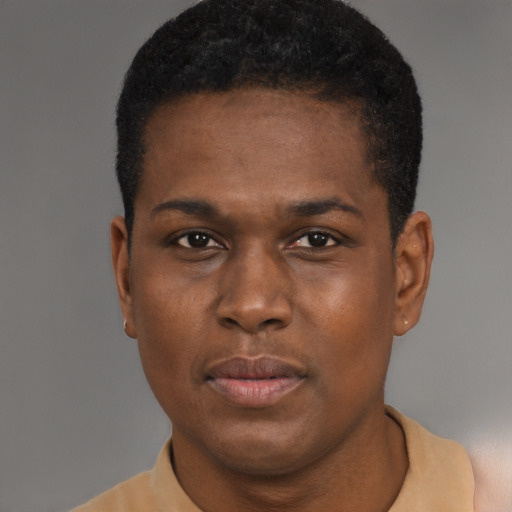 Neutral black young-adult male with short  black hair and brown eyes
