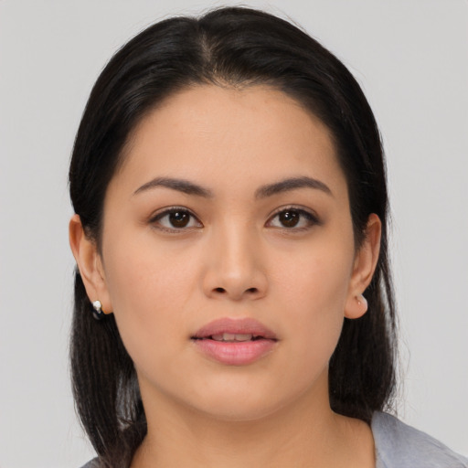 Neutral asian young-adult female with medium  black hair and brown eyes