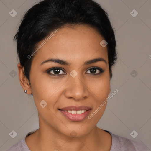 Joyful latino young-adult female with short  brown hair and brown eyes