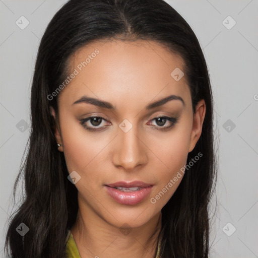 Joyful latino young-adult female with long  brown hair and brown eyes