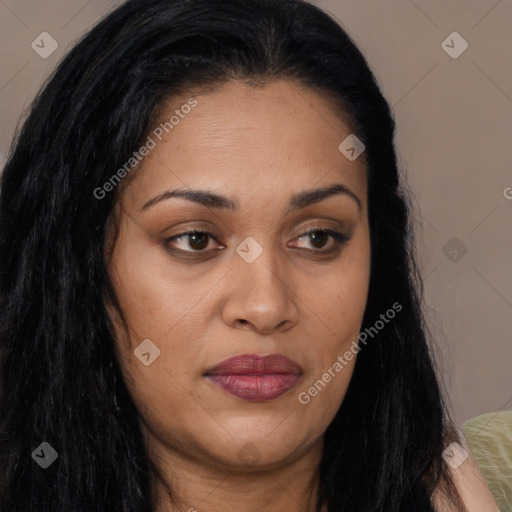 Joyful latino young-adult female with long  brown hair and brown eyes