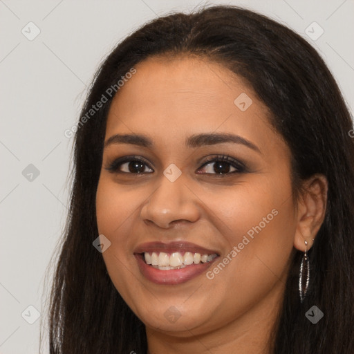 Joyful latino young-adult female with long  brown hair and brown eyes