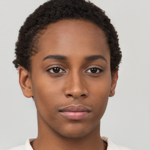 Neutral black young-adult female with short  brown hair and brown eyes