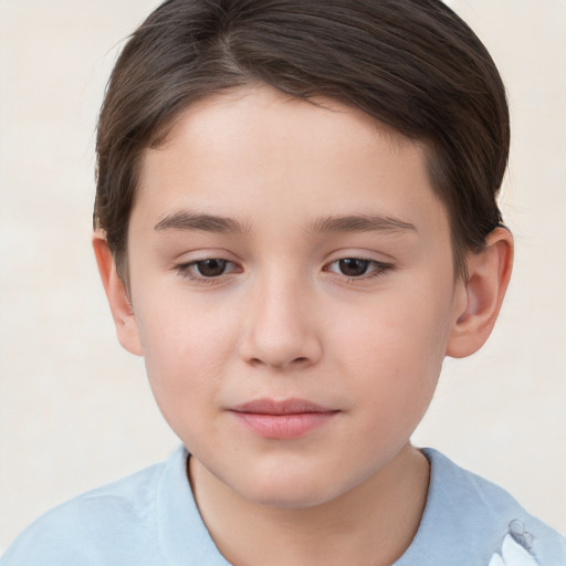 Joyful white child female with short  brown hair and brown eyes