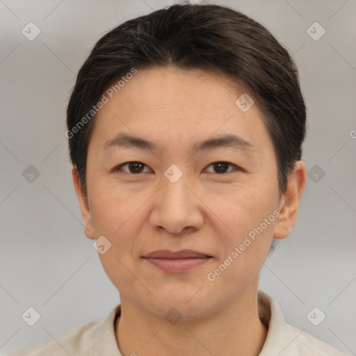 Joyful white adult female with short  brown hair and brown eyes