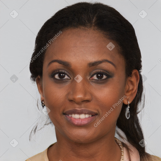 Joyful black young-adult female with medium  brown hair and brown eyes